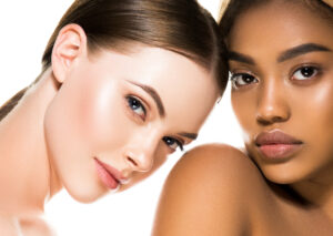 Two women with glowing skin showing benefits of Sculptra in Mount Pleasant, SC
