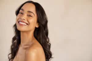 A woman smiling after DEKA DOT Laser Resurfacing in Mount Pleasant