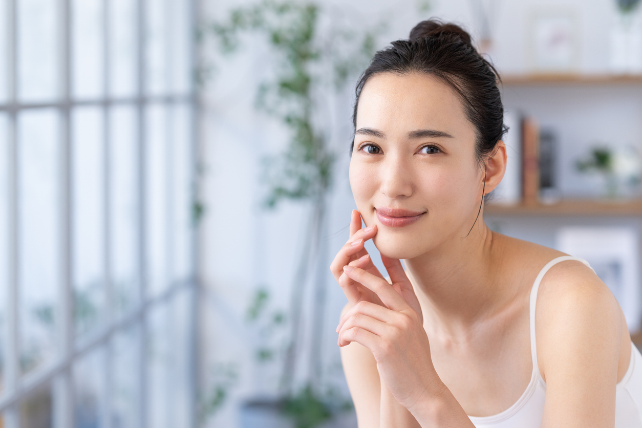 Woman with smooth, even-toned facial skin, representing skin resurfacing with Fraxel DUAL or DEKA DOT laser treatment.